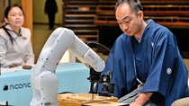 A robot arm (L), developed by Jpanese auto parts maker Denso and operated by computer game software YaneuraOu, plays against professional shogi, or Japanese chess player Shinya Sato (R) in Tokyo on March 22, 2014 at the second match of the Denou-sen between computer and professional shogi players. The computer defeated young professional shogi player Tatsuya Sugai at the first match on March 15 in the five matches in this year's human versus computer series. AFP PHOTO / Yoshikazu TSUNO (Photo credit should read YOSHIKAZU TSUNO/AFP/Getty Images) A robot arm (L), developed by Jpanese auto parts maker Denso and operated by computer game software YaneuraOu, plays against professional shogi, or Japanese chess player Shinya Sato (R) in Tokyo on March 22, 2014 at the second match of the Denou-sen between computer and professional shogi players. The computer defeated young professional shogi player Tatsuya Sugai at the first match on March 15 in the five matches in this year's human versus computer series. AFP PHOTO / Yoshikazu TSUNO (Photo credit should read YOSHIKAZU TSUNO/AFP/Getty Images)
