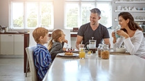 Shot of a family having breakfast together Shot of a family having breakfast together