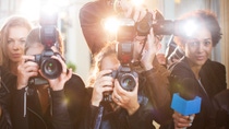 Portrait of paparazzi in a row with cameras and microphone Portrait of paparazzi in a row with cameras and microphone