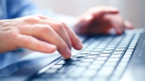 Image of man's hands typing. Selective focus Image of man's hands typing. Selective focus