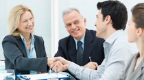 Successful Business Executives Shaking Hands With Each Other