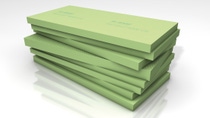 Multiple green rectangular boards stack together Multiple green rectangular boards stack together