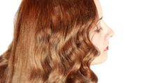 Woman with wavy red hair 