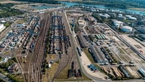 Large industrial and transportation facility from an aerial perspective.