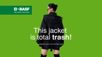 A woman wearing a black jacket against a green background. The text reads: "This jacket is total trash! Discover more in our YouTube video." A woman wearing a black jacket against a green background. The text reads: "This jacket is total trash! Discover more in our YouTube video."