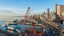Aerial view to the north along the Alaskan Way Viaduct and the Port of Seattle, Elliott Bay and downtown Seattle, at the SR99 Tunnel Project construction site. Aerial view to the north along the Alaskan Way Viaduct and the Port of Seattle, Elliott Bay and downtown Seattle, at the SR99 Tunnel Project construction site.