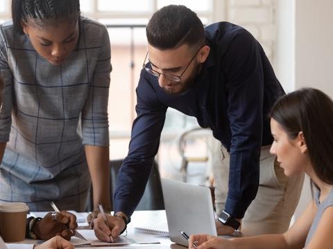 Focused multiracial corporate business team people brainstorm on marketing plan financial report gather at office table meeting, diverse serious colleagues group discuss paperwork engaged in teamwork; Shutterstock ID 1477336811; Jobnummer: 20751351; Projekt: Intra/Internet; Endkunde: BASF SE , FHG/TA, Jasmin Heinemann; Sonstiges: BASF SE, ESI/K Herr Götzger