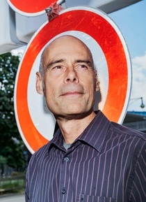 Stefan Gössling in front of a 'No Entry' sign. Stefan Gössling in front of a 'No Entry' sign.